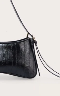 PrettyLittleThing Black Curved Faux Leather Shoulder Bag with Gold Bead Detailing -FRAME Clothing Shop 0e0e956ed142f7361dac569766054d65243ab291 CNN6139 4 black curved beaded shoulder bag