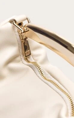 PrettyLittleThing Cream PU Gold Abstract Handle β Sculptural Mini Hand Bag 8 PrettyLittleThing Cream PU Gold Abstract Handle β Sculptural Mini Hand Bag -FRAME Clothing Shop 10e9f52517f865de1aca31cc8f876d6c12ecdde3 CNM7717 4 cream pu gold abstract handle hand bag