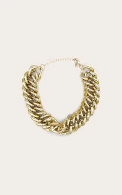 PrettyLittleThing Gold Extra Chunky Statement Chain Necklace -FRAME Clothing Shop 16b89b087bfc3ae59f386ce98dfdd05bf5b11d1d CMW1001 1 gold extra chunky chain detail necklace