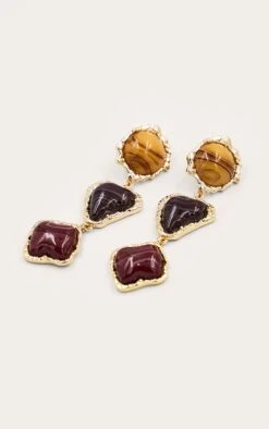 Prettylittlething Gold Textured Tri Colored Stone Draped Earrings -FRAME Clothing Shop 1c0fd548fd28e1086841ca30166675bf8cb98ad3 CNO2934 3 gold textured tri coloured stone draped earrings