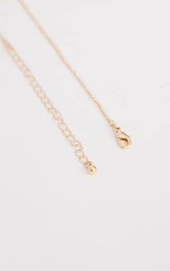 PrettyLittleThing Gold Recycled Brass Dainty Heart Multi-Pendant Short Chain Necklace -FRAME Clothing Shop 20aaf2018c30e22d47de901ba7333f79802f5a6e cmv3034 4