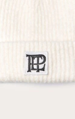 Prettylittlething PLT Logo Cream Brushed Knit Fold Over Beanie 5 Prettylittlething PLT Logo Cream Brushed Knit Fold Over Beanie -FRAME Clothing Shop 21695c42261fd463a5b83b833ceaae8f54472f20 CNO3264 3 plt logo cream brushed knit fold over beanie