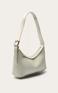PrettyLittleThing Cream Patent PU Simple Buckle Strap Shoulder Bag -FRAME Clothing Shop 244914afa14804fdc75bea5403bff7ab71647a4a CNO0734 3 cream pu simple buckle strap shoulder bag