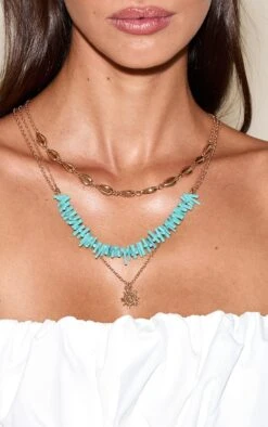 PrettyLittleThing Aqua Beaded Layered Starfish Pendant Gold Necklace – Coastal Charm Triple Layer Jewelry