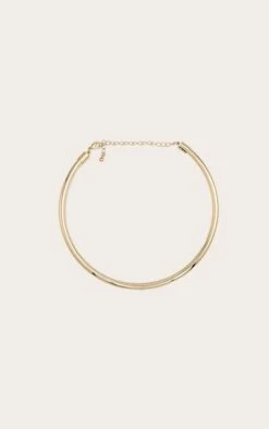 PrettyLittleThing Gold Polished Minimalist Metal Bar Choker Necklace -FRAME Clothing Shop 45d2035e91f87cca93162462ec0c182fc3ddb0d9 CNM1945 1 gold metal bar choker