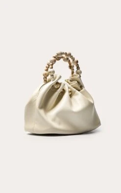 Cream Beaded Handle Grab Bag -FRAME Clothing Shop 51bd3a019d18466628d372b9b1ef49bef0c90c1b CNO2102 3 cream beaded handle grab bag