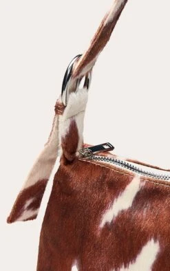 PrettyLittleThing Cow Print Pony Hair Effect Adjustable Shoulder Bag - Black & White 8 PrettyLittleThing Cow Print Pony Hair Effect Adjustable Shoulder Bag - Black & White -FRAME Clothing Shop 532a1b7c133226d6530a445354d2ba8656dc4720 CNO3433 4 cow pony hair adjustable shoulder bag