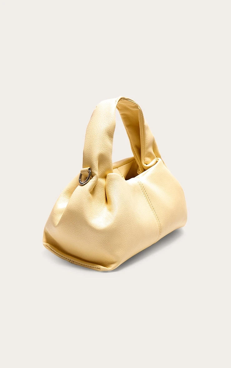 PrettyLittleThing Butter Cream Slouchy Mini PU Handbag – Chic Off-Duty Shoulder Bag 2 PrettyLittleThing Butter Cream Slouchy Mini PU Handbag – Chic Off-Duty Shoulder Bag - Image 2