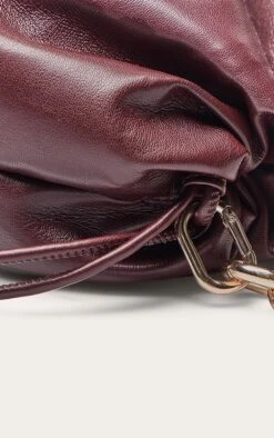 PrettyLittleThing Burgundy Beaded Chain Ruched Pouch Grab Bag -FRAME Clothing Shop 5fba2c7254db80ad482f07baa0b4e67467801157 CNO2096 5 burgundy chain bead pouch grab bag
