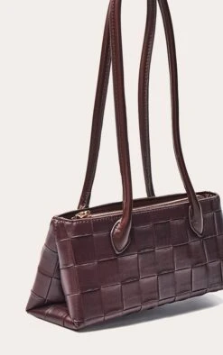 PrettyLittleThing Chocolate Woven Texture Elongated Handle Slim Shoulder Bag -FRAME Clothing Shop 6599f17d389a590602324fc44eeb3127b88a887c CNO2094 3 chocolate weave elongated handle shoulder bag