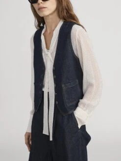 The Denim Vest -- Rinse -FRAME Clothing Shop 7044105 RINS 4015105 RINS 2707 vest side angle image
