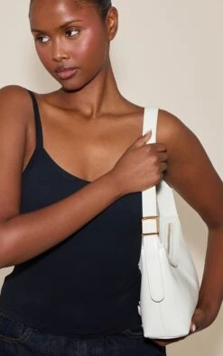 PrettyLittleThing Cream Patent PU Simple Buckle Strap Shoulder Bag