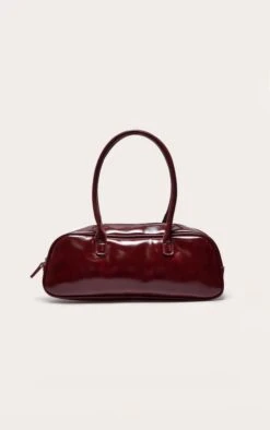 PrettyLittleThing Burgundy Patent PU High-Shine Baguette Shoulder Bag - Vintage Inspired