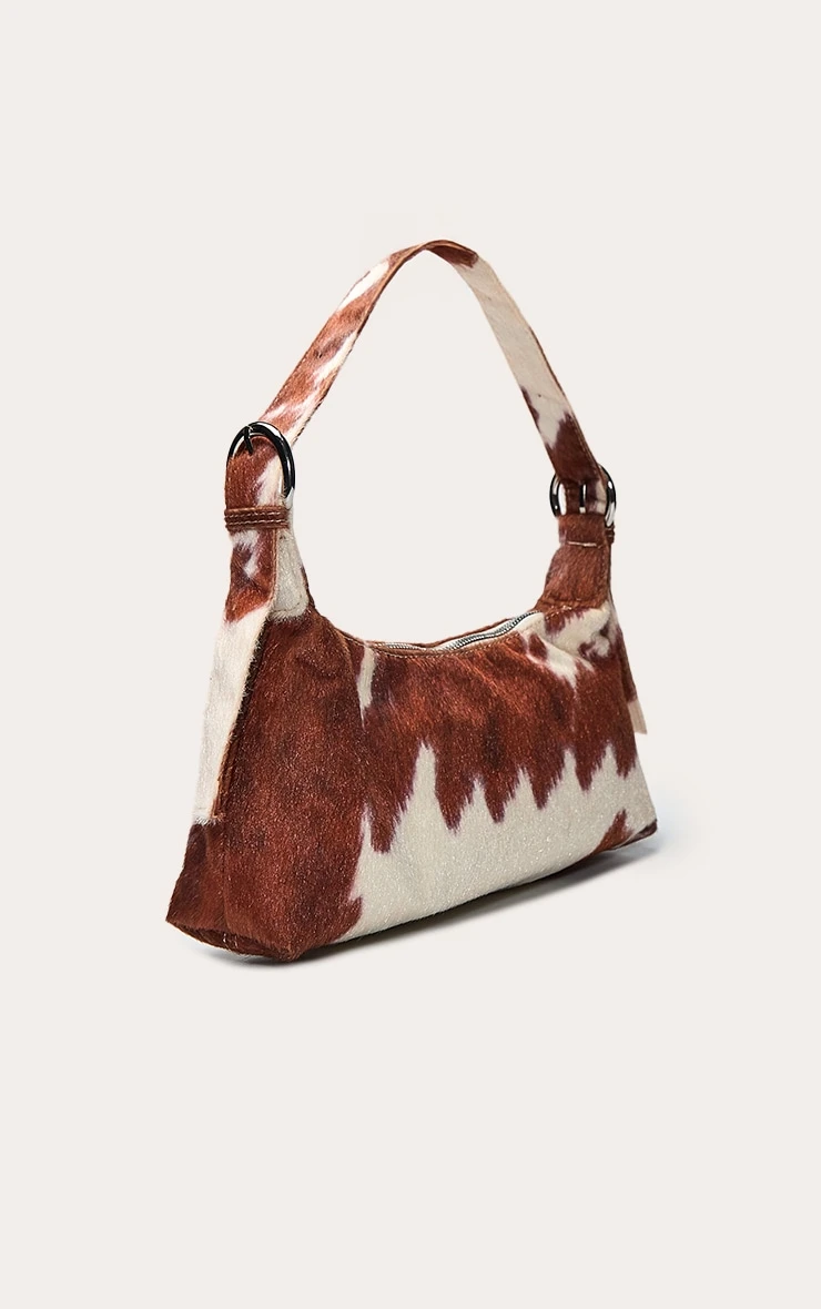 PrettyLittleThing Cow Print Pony Hair Effect Adjustable Shoulder Bag - Black & White 3 PrettyLittleThing Cow Print Pony Hair Effect Adjustable Shoulder Bag - Black & White - Image 3