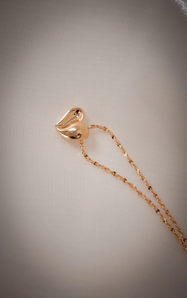 PrettyLittleThing Gold Abstract Heart Detail Necklace β Elegant Molten Pendant Jewelry 4 PrettyLittleThing Gold Abstract Heart Detail Necklace β Elegant Molten Pendant Jewelry - Image 4