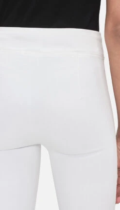 The Jetset Crop Mini Boot -- White 7 The Jetset Crop Mini Boot -- White -FRAME Clothing Shop JSCMB632 WHT 6195 jean back detail image