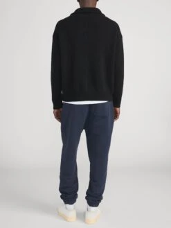 FRAME x Ritz Paris Navy Embroidered Logo Luxury Sweatpants - Essential Cuffed Joggers 15 FRAME x Ritz Paris Navy Embroidered Logo Luxury Sweatpants - Essential Cuffed Joggers -FRAME Clothing Shop LMAC0279 NAVY 02570 OnModel BackShot