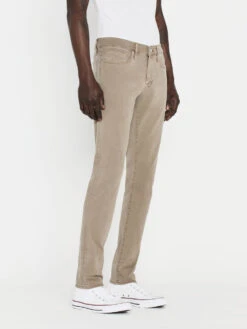 FRAME L'Homme Slim Fit Twill Pants in Garage Grime – Distressed 5-Pocket Trousers -FRAME Clothing Shop LMH445 GAGM SAYE 1602LR jeans side view