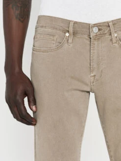 FRAME L'Homme Slim Fit Twill Pants in Garage Grime – Distressed 5-Pocket Trousers -FRAME Clothing Shop LMH445 GAGM SAYE 1641LR jeans front detail image