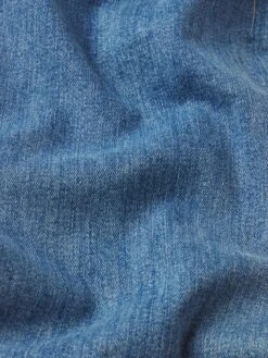 L'Homme Slim -- Titan 11 L'Homme Slim -- Titan -FRAME Clothing Shop LMH469 TITN FABRICDETAIL jeans texture detail image