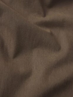 L'Homme Slim Brushed Twill -- Old Sage -FRAME Clothing Shop LMH870 OLSG B FABRICDETAIL jeans texture detail image