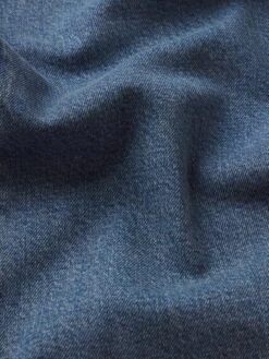 Men's Bootcut Jean in Western Wash – Modern Stretch Fit Denim -FRAME Clothing Shop LMSBT889 WERN FABRICDETAIL jeans texture detail image