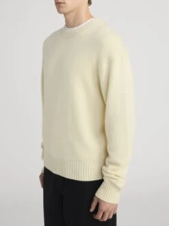 Premium 100% Cashmere Crewneck Sweater in Pale Yellow – Classic Fit Ribbed Detail Knit -FRAME Clothing Shop LMSW0156 PYLW 1444 sweater side angle image