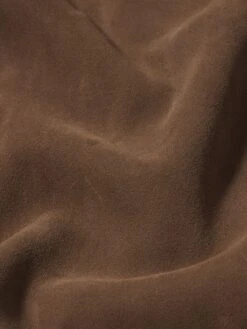 Men's Mocha Supple Suede Trucker Jacket – Premium Silver Hardware Utility Outerwear 13 Men's Mocha Supple Suede Trucker Jacket – Premium Silver Hardware Utility Outerwear -FRAME Clothing Shop ME25LJA006 MCHA FABRICDET V2 jacket texture detail image