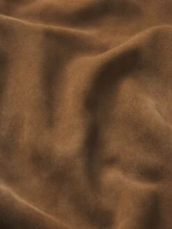 Men's Caramel Goat Suede Blazer β 70s Inspired Tailored Jacket 8 Men's Caramel Goat Suede Blazer β 70s Inspired Tailored Jacket -FRAME Clothing Shop MF25LJA002 CRME FABRICDETAIL jacket texture detail image