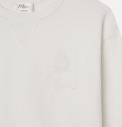 Ritz Paris Cream Tonal Logo & Crest – Luxe Cotton-Blend Crewneck Sweatshirt 18 Ritz Paris Cream Tonal Logo & Crest – Luxe Cotton-Blend Crewneck Sweatshirt -FRAME Clothing Shop MP25JSS006 CREA 1 sweatshirt front detail packshot image