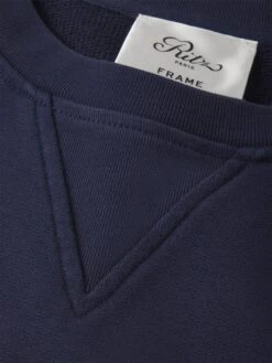 Ritz Paris Dark Navy Tonal Logo Crewneck – Exclusive Embroidered Crest Sweatshirt -FRAME Clothing Shop MP25JSS006 DKNV FABRIC DET2 sweatshirt texture detail image