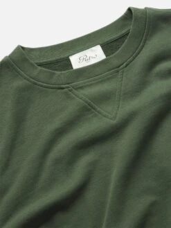 Ritz Paris Hunter Green Tonal Logo – Embroidered Crest Unisex V-Stitch Crewneck 21 Ritz Paris Hunter Green Tonal Logo – Embroidered Crest Unisex V-Stitch Crewneck -FRAME Clothing Shop MP25JSS006 HNGR FABRIC DET1 V2 sweatshirt texture detail image