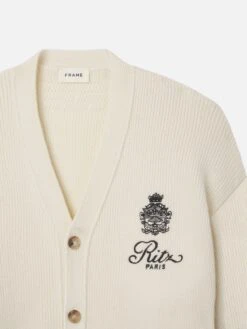 Ritz Paris Cream Cashmere Cardigan – Embroidered Crest Relaxed Fit Sweater -FRAME Clothing Shop MP25KSW025 CREA DET cardi front detail packshot image