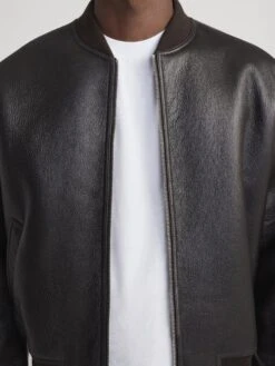 Men's Dark Brown 100% Shearling Bomber Jacket – Rugged Winter Outerwear 11 Men's Dark Brown 100% Shearling Bomber Jacket – Rugged Winter Outerwear -FRAME Clothing Shop MP26LJA007 DKBR 0826 jacket front detail image