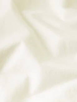 Premium Supima Light Cotton Tee – Off White Crewneck Short Sleeve 7 Premium Supima Light Cotton Tee – Off White Crewneck Short Sleeve -FRAME Clothing Shop MS25JTE001 OFFW FABRIC DETAIL top texture detail image