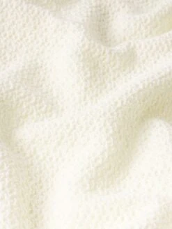 Men's Cream Open Weave Short Sleeve Shirt – Breathable Textured Knit with Spread Collar 7 Men's Cream Open Weave Short Sleeve Shirt – Breathable Textured Knit with Spread Collar -FRAME Clothing Shop MS25WSH015 CREA FABRIC DETAIL top texture detail image