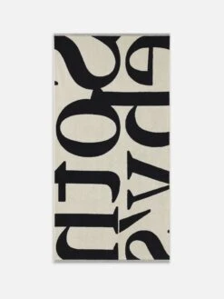 Sotheby’s Cream Multi Cotton Terry Towel – Navy & White Lettering Oversized Beach Towel -FRAME Clothing Shop WE25AOT001 CREM B ee575d98 1cdf 47f8 96a8 82deb59a17b2 towel back packshot image