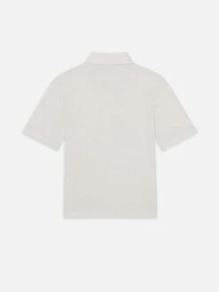 The Caddy Polo -- Cream 7 The Caddy Polo -- Cream -FRAME Clothing Shop WE25JKT006 CREA B V2 polo back packshot image