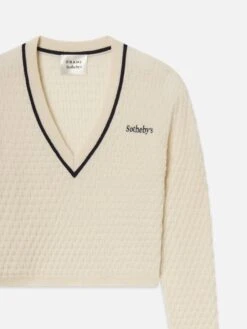 Sotheby’s Women's V-Neck Sweater -- Cream -FRAME Clothing Shop WE25KSW046 CREA DET sweater front detail packshot image
