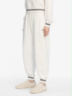 The Tennis Sweatpant -- White -FRAME Clothing Shop WF25JPA001 WHT WF25JSS004 WHT 13060 pants side angle image