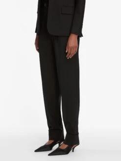 The Cuffed Pleated Trouser -- Black -FRAME Clothing Shop WF25WBZ001 BLK WF25KSW030 BLK WF25WPA001 BLK 12568 pants side angle image