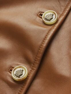 Ritz Femme Leather Jacket -- Camel -FRAME Clothing Shop WP25LJA008 CAML FABRIC DET jacket texture detail image