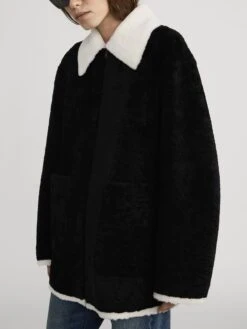 The Shearling Jacket -- Black 12 The Shearling Jacket -- Black -FRAME Clothing Shop WP26LJA012 BLK 2125 jacket side angle image
