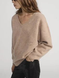 The Cashmere Brushed V Sweater -- Light Camel -FRAME Clothing Shop WP26LPA008 BLK WP26KSW066 LTCM 2437 sweater side angle image