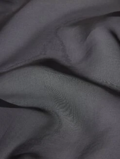 The Organza Cape L/S Top -- Black -FRAME Clothing Shop WP26WSH016 BLK FABRICDETAIL cape texture detail image