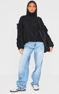 Prettylittlething Black Cable Knit Tassel Detail Roll Neck Sweater -FRAME Clothing Shop a21f243862a269150d74936f8b8139cb9ca62a1d cnk3948 3