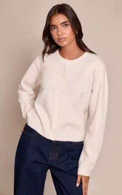 PrettyLittleThing Cream Round Neck Knit Cardigan - Cropped Button-Front Essential 8 PrettyLittleThing Cream Round Neck Knit Cardigan - Cropped Button-Front Essential -FRAME Clothing Shop a3d9d7393b4b2a9fd16f631a16f95f1a0dc94ff4 CNN6362 1 cream round neck knit cardigan