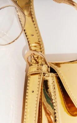 Prettylittlething Gold Metallic Trapeze Shoulder Bag -FRAME Clothing Shop a7b1acda83ab952fb4f55c676417aed9cf10aaa7 cng7168 4
