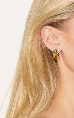 PrettyLittleThing Gold Chunky Abstract Twist Statement Earrings - Recycled Steel Sculptural Studs -FRAME Clothing Shop b08e990107d3a349f20cded81167e49b0d2afd99 CNL6256 3 gold chunky abstract twist statement earrings
