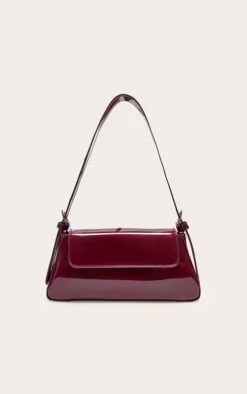 PrettyLittleThing Burgundy Patent Trapeze Shoulder Bag – High-Shine Modern Evening Handbag